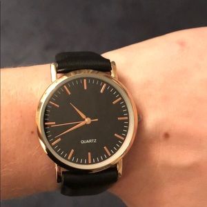 Black and gold watch